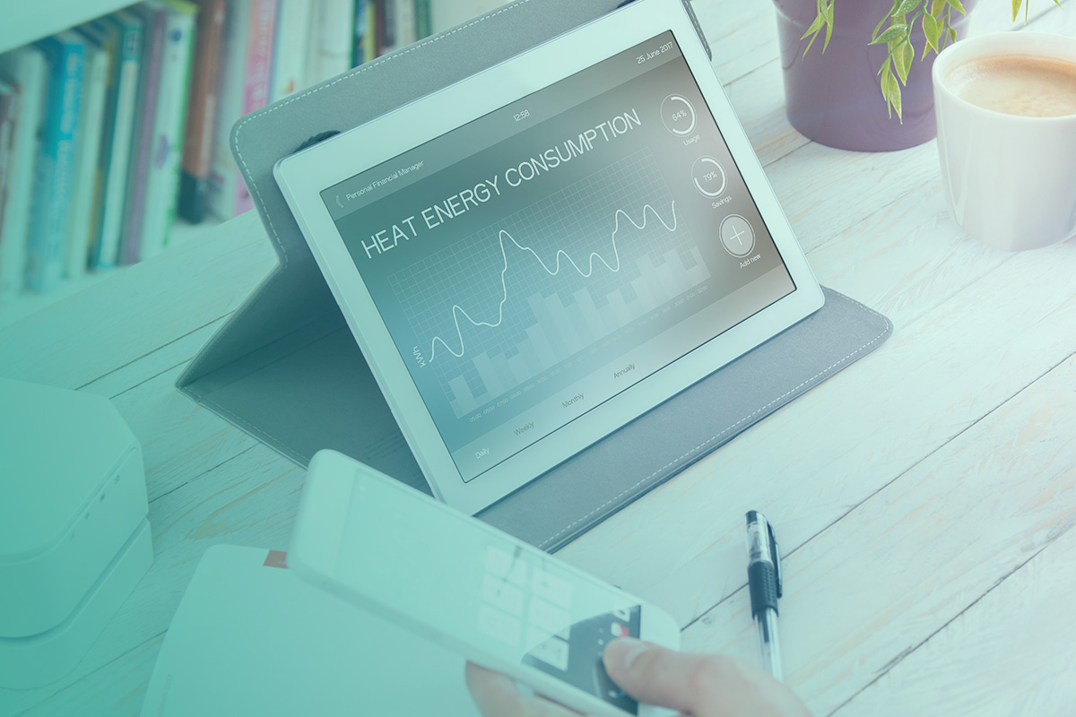 “Tablet showing heat energy consumption data, representing Commercial Sub-metering and Data Management for accurate tracking and monitoring.”