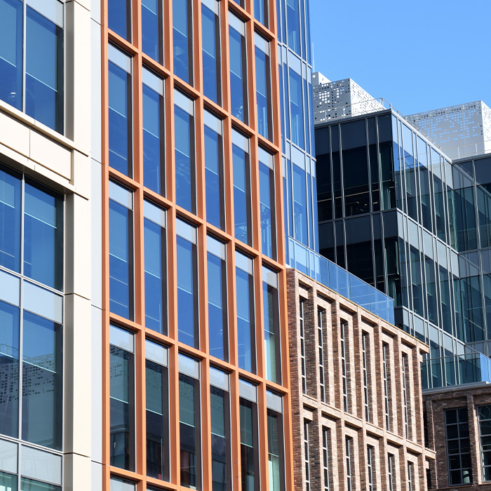 Modern commercial buildings with large glazed façades — typical assets requiring timely EPC compliance.