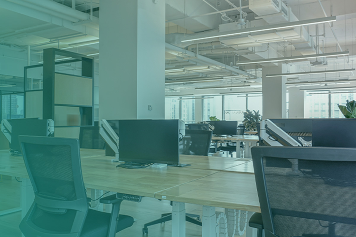 “Modern open-plan office interior illustrating the importance of MEES Compliance Services for Commercial Properties.”