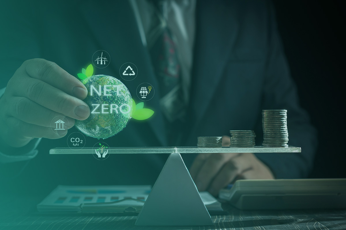 “A business professional analysing sustainability data and energy charts on a digital screen, symbolising Net Zero Procurement; Sustainable Energy Buying for UK Organisations.”