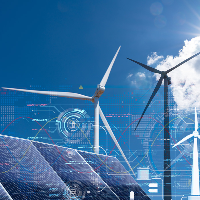 Wind turbines and solar panels with digital overlays representing intelligent net zero procurement systems.