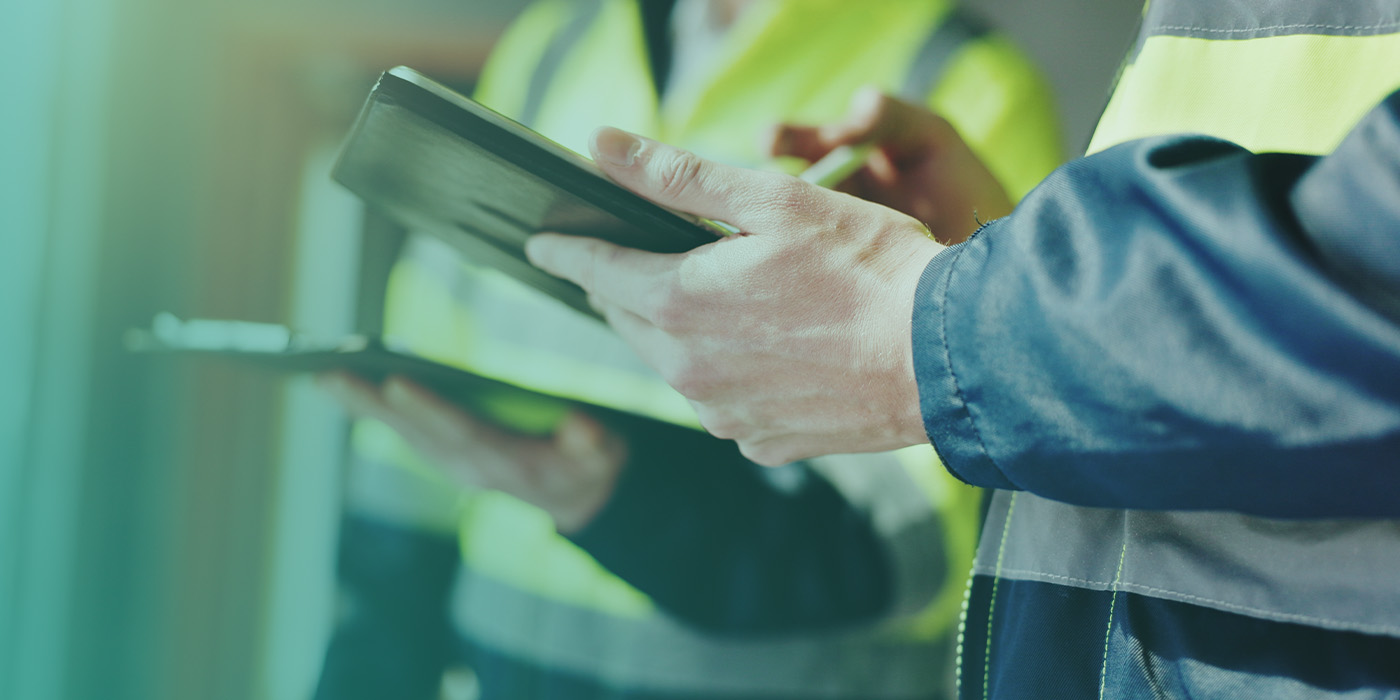 Engineers reviewing project data on-site as part of the Smart Metering Toolkit for Landlords & Developers, ensuring accurate planning and compliance.